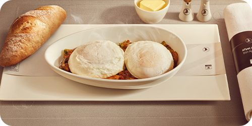 Turkish Airlines Business Class breakfast service on domestic flights, featuring a meal prepared with fresh products